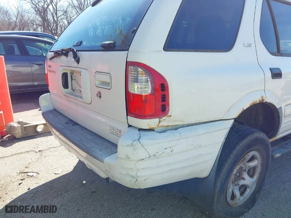 2002 Isuzu Rodeo with VIN 4S2DM58W624304459, listed as a IAAI auction lot 41853398 with 169,313 mi miles. Bid and sale history available at carsss.com. Image 6.