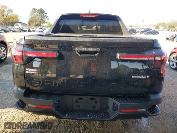 2024 Hyundai Santa Cruz Night Edition z VIN 5NTJCDAF5RH078765, wystawiony jako Copart lot #50633065 z przebiegiem 33 782 mil mil oraz Szkoda całkowita • Salvage title. Historia ofert i sprzedaży dostępna na DreamBid. Obrazek 6.