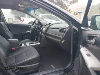2014 Toyota Camry L with VIN 4T1BF1FK2EU816743, listed as a IAAI auction lot 42047519 with 266,904 mi miles. Bid and sale history available at carsss.com. Image 5.
