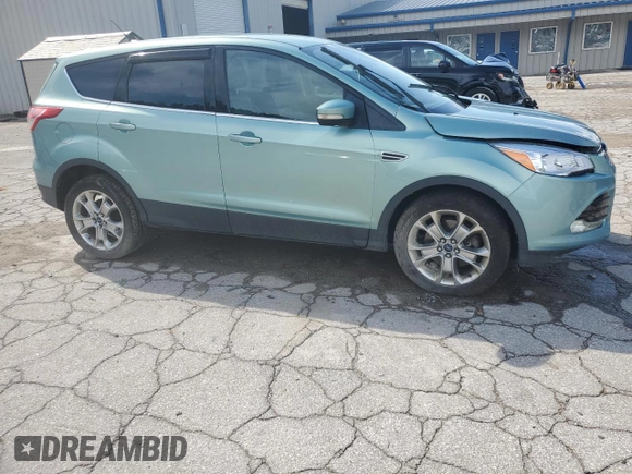 2013 Ford Escape SEL z VIN 1FMCU9H98DUC56048, wystawiony jako Copart lot #61613085 z przebiegiem 198 102 mil mil oraz Szkoda całkowita • Salvage title. Historia ofert i sprzedaży dostępna na DreamBid. Obrazek 4.
