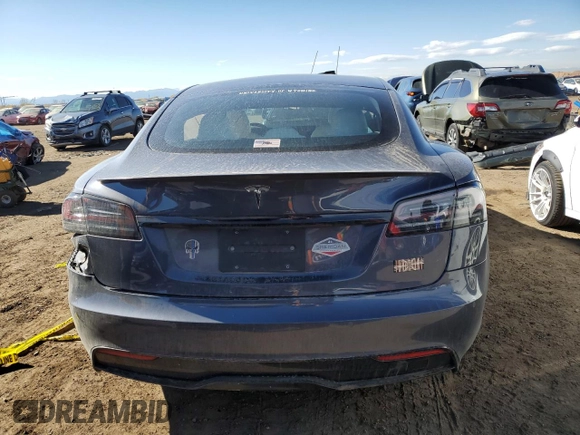 2023 Tesla Model S Plaid with VIN 5YJSA1E64PF499373, listed as a Copart auction lot 78744674 with Not provided miles and Salvage title. Bid and sale history available at DreamBid. Image 6.