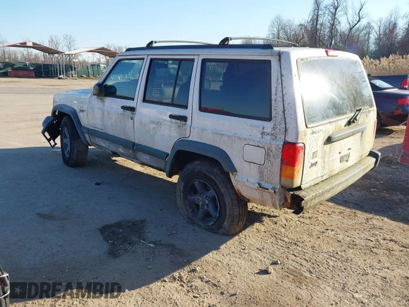1997 Jeep Cherokee Sport with VIN 1J4FJ68S3VL551278, listed as a IAAI auction lot 41660577 with 282,264 mi miles. Bid and sale history available at carsss.com. Image 3.