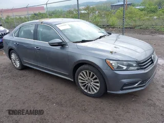 2016 Volkswagen Passat SE z VIN 1VWBT7A34GC031517, wystawiony jako IAAI lot #42209000 z przebiegiem 182 772 mil mil oraz . Historia ofert i sprzedaży dostępna na DreamBid. Obrazek 1.