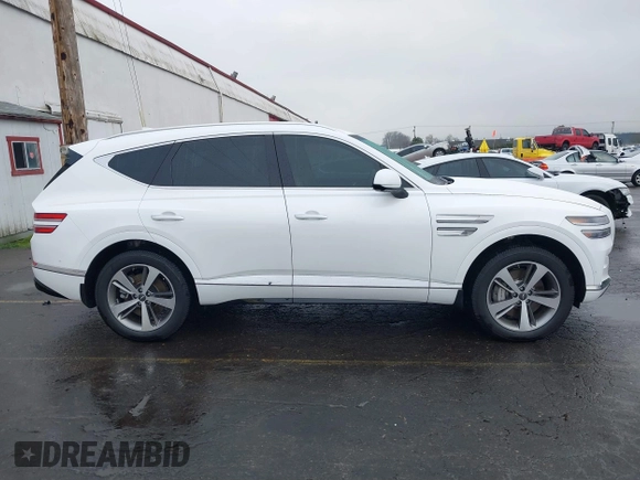 2021 Genesis GV80 with VIN KMUHCESC2MU052594, listed as a IAAI auction lot 41273763 with 19,190 mi miles and . Bid and sale history available at DreamBid. Image 13.
