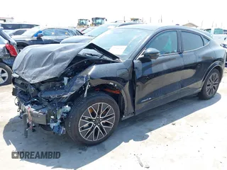 2024 Ford Mustang Mach-E Premium z VIN 3FMTK3SU6RMA04875, wystawiony jako IAAI lot #42296785 z przebiegiem 17 340 mil mil oraz . Historia ofert i sprzedaży dostępna na DreamBid. Obrazek 2.