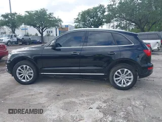 2015 Audi Q5 Premium with VIN WA1CFAFP0FA041103, listed as a IAAI auction lot 42154624 with 123,107 mi miles. Bid and sale history available at carsss.com. Image 14.