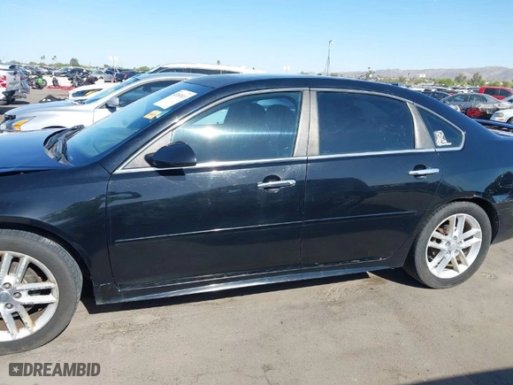 2013 Chevrolet Impala LTZ with VIN 2G1WC5E3XD1208357, listed as a IAAI auction lot 42053811 with 376,518 mi miles. Bid and sale history available at carsss.com. Image 14.