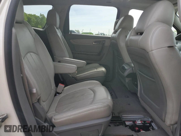 2013 Chevrolet Traverse LTZ z VIN 1GNKVLKD6DJ107802, wystawiony jako Copart lot #58519305 z przebiegiem 157 046 mil mil oraz Czysty tytuł • Clean title. Historia ofert i sprzedaży dostępna na DreamBid. Obrazek 11.