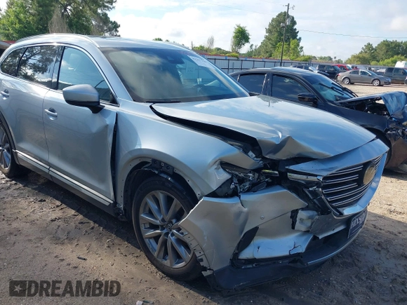 2020 Mazda CX-9 Grand Touring with VIN JM3TCADY2L0406173, listed as a IAAI auction lot 42217230 with 110,465 mi miles and . Bid and sale history available at DreamBid. Image 6.