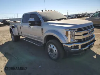 2019 Ford F-450 XL with VIN 1FT8W4DTXKEG74353, listed as a Copart auction lot 71077974 with 138,672 mi miles and Salvage Title. Bid and sale history available at carsss.com. Image 4.