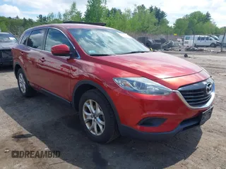 2014 Mazda CX-9 Touring z VIN JM3TB3CV8E0425951, wystawiony jako IAAI lot #42250360 z przebiegiem 158 627 mil mil oraz . Historia ofert i sprzedaży dostępna na DreamBid. Obrazek 1.