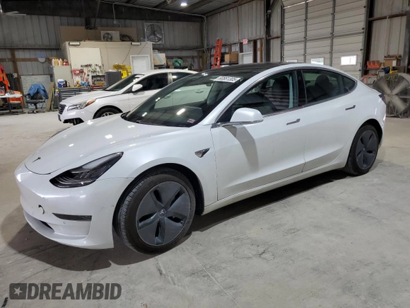 2019 Tesla Model 3 Mid Range z VIN 5YJ3E1EA3KF427229, wystawiony jako Copart lot #60881305 z przebiegiem 78 975 mil mil oraz Czysty tytuł • Clean title. Historia ofert i sprzedaży dostępna na DreamBid. Obrazek 1.