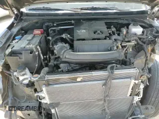 2023 Nissan Frontier Pro-X with VIN 1N6ED1EJ6PN645487, listed as a Copart auction lot 67962665 with 33,691 mi miles and Salvage title. Bid and sale history available at DreamBid. Image 14.