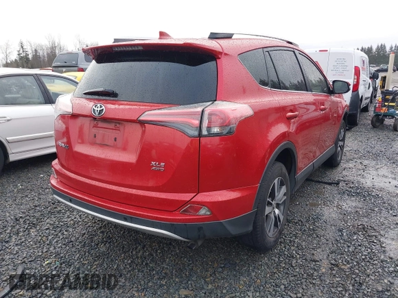 2016 Toyota RAV4 XLE with VIN JTMRFREV5GJ092337, listed as a IAAI auction lot 41597345 with 84,292 mi miles and . Bid and sale history available at DreamBid. Image 4.