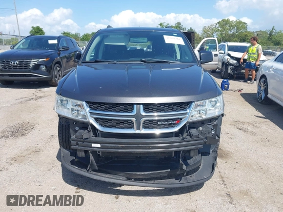 2017 Dodge Journey SE with VIN 3C4PDCAB2HT579852, listed as a IAAI auction lot 42008261 with 112,234 mi miles and . Bid and sale history available at DreamBid. Image 12.