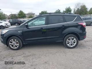 2017 Ford Escape SE with VIN 1FMCU9GD0HUC58128, listed as a IAAI auction lot 42078045 with 125,503 mi miles. Bid and sale history available at carsss.com. Image 14.