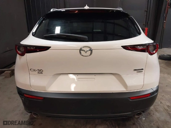 2024 Mazda CX-30 2.5 Turbo Premium Package with VIN 3MVDMBDY7RM706554, listed as a IAAI auction lot 41553002 with 2,817 mi miles. Bid and sale history available at carsss.com. Image 16.