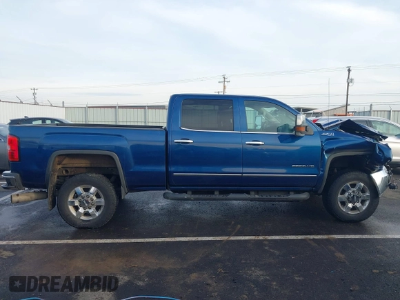 2015 GMC Sierra 2500HD SLT z VIN 1GT12ZE84FF574009, wystawiony jako IAAI lot #41048785 z przebiegiem 167 845 mil mil oraz . Historia ofert i sprzedaży dostępna na DreamBid. Obrazek 14.