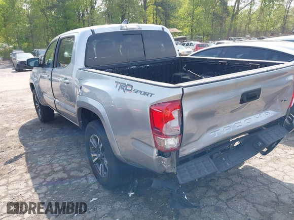 2017 Toyota Tacoma SR5 with VIN 5TFAZ5CN3HX042874, listed as a IAAI auction lot 42022752 with 104,013 mi miles and . Bid and sale history available at carsss.com. Image 3.