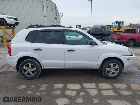 2006 Hyundai Tucson GL with VIN KM8JM12BX6U467288, listed as a IAAI auction lot 41679827 with 146,973 mi miles. Bid and sale history available at carsss.com. Image 14.