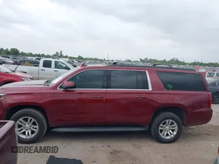 2020 Chevrolet Suburban LT z VIN 1GNSCHKC9LR233596, wystawiony jako IAAI lot #41943325 z przebiegiem 97 515 mil mil oraz . Historia ofert i sprzedaży dostępna na DreamBid. Obrazek 14.