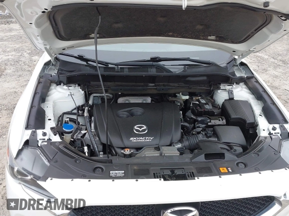 2017 Mazda CX-5 Touring with VIN JM3KFACL8H0205717, listed as a IAAI auction lot 41173725 with 107,604 mi miles. Bid and sale history available at carsss.com. Image 10.