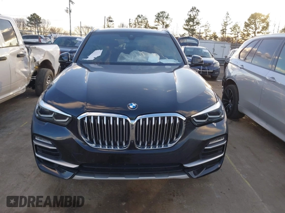 2021 BMW X5 xDrive40i with VIN 5UXCR6C08M9D76272, listed as a IAAI auction lot 41219782 with 56,599 mi miles and . Bid and sale history available at DreamBid. Image 12.