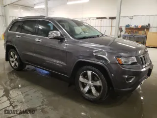 2014 Jeep Grand Cherokee Overland with VIN 1C4RJFCG6EC279248, listed as a Copart auction lot 49300895 with 165,248 mi miles and Salvage Title. Bid and sale history available at carsss.com. Image 4.