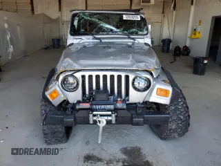 2006 Jeep Wrangler Rubicon with VIN 1J4FA69S26P734731, listed as a Copart auction lot 52009295 with 117,872 mi miles and Salvage title. Bid and sale history available at DreamBid. Image 5.