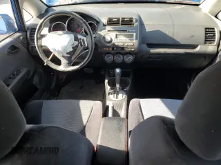 2007 Honda Fit Sport with VIN JHMGD38607S004236, listed as a Copart auction lot 52781415 with 313,559 mi miles and Salvage Title. Bid and sale history available at carsss.com. Image 8.