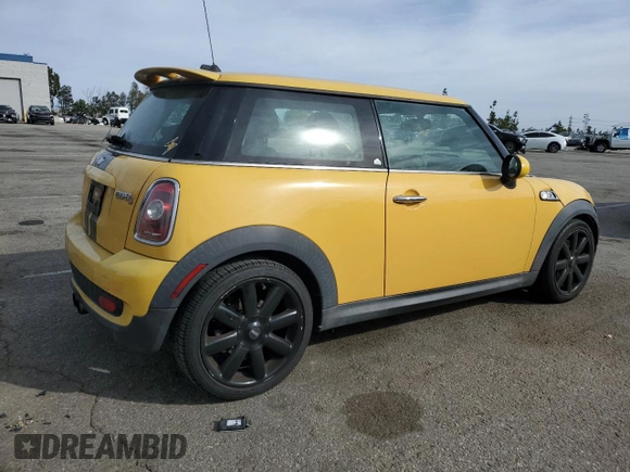 2009 MINI Hardtop S with VIN WMWMF73599TW87679, listed as a Copart auction lot 46863725 with 102,976 mi miles and Salvage title. Bid and sale history available at DreamBid. Image 3.