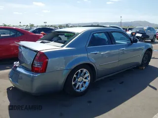 2006 Chrysler 300 C with VIN 2C3KA63H56H313967, listed as a IAAI auction lot 42056998 with 143,592 mi miles and . Bid and sale history available at carsss.com. Image 4.