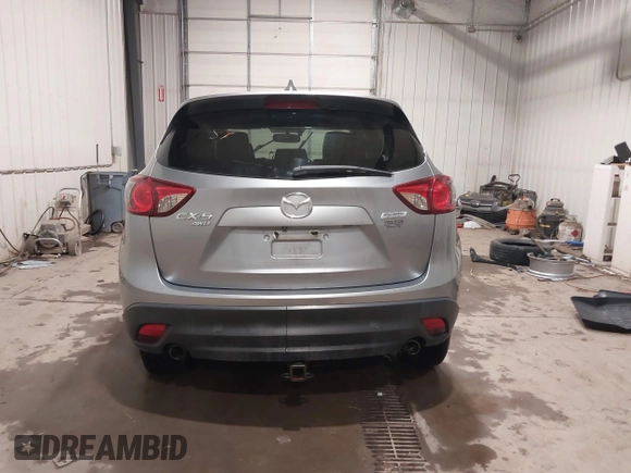2015 Mazda CX-5 Grand Touring with VIN JM3KE4DY2F0477966, listed as a IAAI auction lot 41247178 with 116,582 mi miles. Bid and sale history available at carsss.com. Image 17.