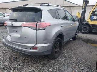 2016 Toyota RAV4 LE with VIN 2T3ZFREV5GW251763, listed as a IAAI auction lot 41655532 with 147,873 mi miles. Bid and sale history available at carsss.com. Image 4.