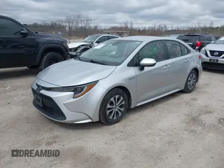 2020 Toyota Corolla Hybrid LE with VIN JTDEBRBE1LJ008409, listed as a IAAI auction lot 41948940 with 102,402 mi miles. Bid and sale history available at carsss.com. Image 2.