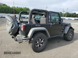 2011 Jeep Wrangler Rubicon with VIN 1J4BA6D12BL507652, listed as a Copart auction lot 69989964 with 127,493 mi miles and Salvage title. Bid and sale history available at DreamBid. Image 3.