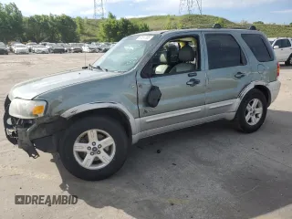 2005 Ford Escape Hybrid with VIN 1FMCU95HX5KE24619, listed as a Copart auction lot 60624765 with 209,937 mi miles and Non repairable. Bid and sale history available at DreamBid. Image 1.