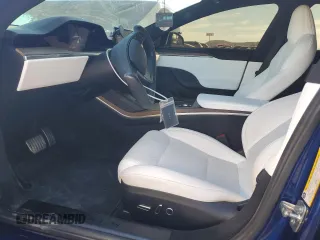 2023 Tesla Model S with VIN 5YJSA1E57PF498760, listed as a Copart auction lot 88494905 with 39,521 mi miles and Salvage title. Bid and sale history available at DreamBid. Image 7.