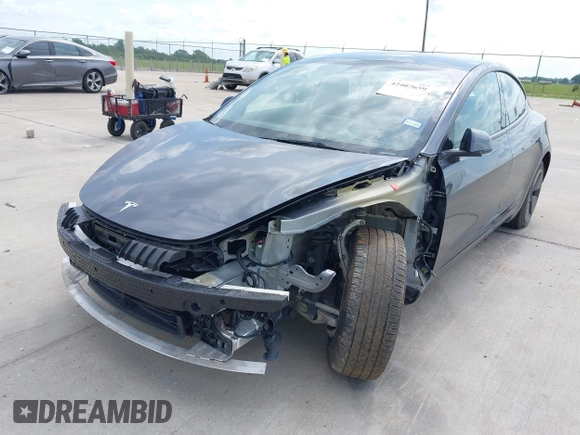 2023 Tesla Model 3 with VIN 5YJ3E1EA7PF417293, listed as a IAAI auction lot 42407659 with 22,578 mi miles and . Bid and sale history available at DreamBid. Image 6.