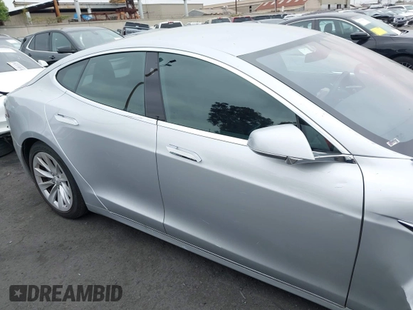 2017 Tesla Model S 100D with VIN 5YJSA1E24HF193563, listed as a IAAI auction lot 42120120 with 60,391 mi miles and . Bid and sale history available at DreamBid. Image 14.