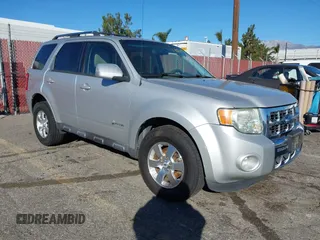 2009 Ford Escape Hybrid with VIN 1FMCU49389KA14781, listed as a IAAI auction lot 41409142 with 155,728 mi miles. Bid and sale history available at carsss.com. Image 1.