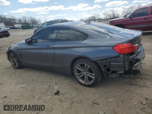 2015 BMW 4 Series 428i xDrive with VIN WBA3N9C55FK247227, listed as a Copart auction lot 50564735 with 121,882 mi miles and Salvage title. Bid and sale history available at DreamBid. Image 2.