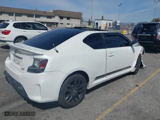 2015 Scion tC with VIN JTKJF5C71F3095189, listed as a IAAI auction lot 41847417 with 129,164 mi miles. Bid and sale history available at carsss.com. Image 4.