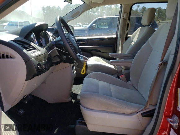 2014 Dodge Grand Caravan American Value with VIN 2C4RDGBG3ER323793, listed as a Copart auction lot 49095945 with 102,129 mi miles and Salvage Title. Bid and sale history available at DreamBid. Image 7.