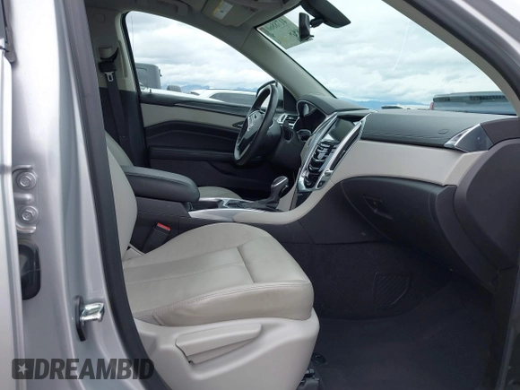 2015 Cadillac SRX with VIN 3GYFNAE34FS629258, listed as a IAAI auction lot 41788601 with 56,939 mi miles and . Bid and sale history available at DreamBid. Image 5.