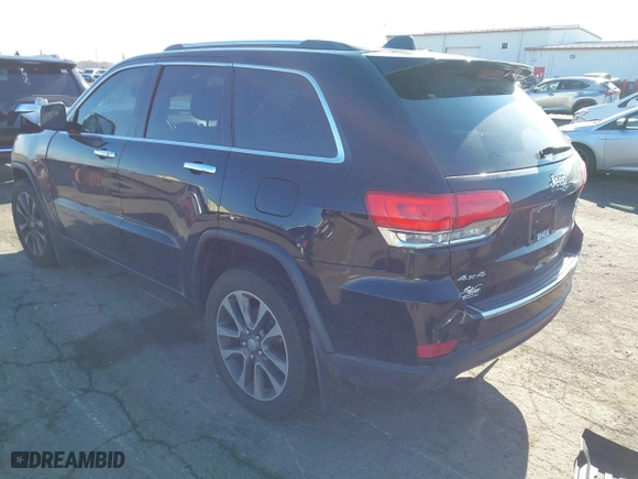 2018 Jeep Grand Cherokee Limited with VIN 1C4RJFBG0JC261355, listed as a IAAI auction lot 40790316 with 76,244 mi miles. Bid and sale history available at carsss.com. Image 3.
