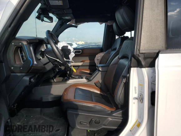 2023 Ford Bronco with VIN 1FMEE5DP5PLA95882, listed as a Copart auction lot 44057865 with 32,410 mi miles and Salvage Title. Bid and sale history available at DreamBid. Image 7.