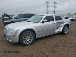 2006 Chrysler 300 C z VIN 2C3LK63H96H513395, wystawiony jako Copart lot #57663475 z przebiegiem 188 048 mil mil oraz Szkoda całkowita • Salvage title. Historia ofert i sprzedaży dostępna na DreamBid. Obrazek 1.