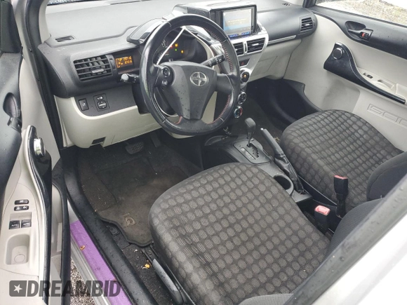 2012 Scion iQ z VIN JTNJJXB08CJ012348, wystawiony jako Copart lot #45415315 z przebiegiem 87 315 mil mil oraz Szkoda całkowita • Salvage title. Historia ofert i sprzedaży dostępna na DreamBid. Obrazek 8.