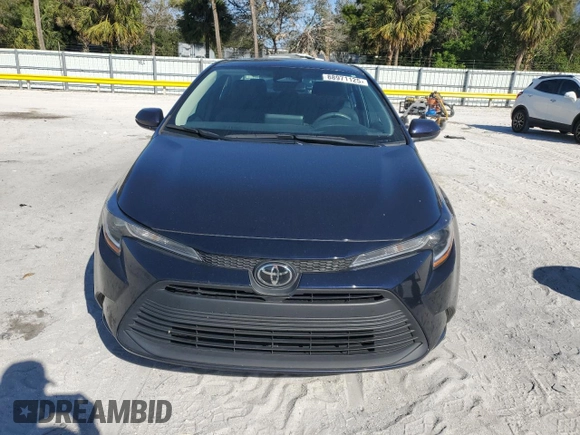 2023 Toyota Corolla LE with VIN 5YFB4MDE7PP044619, listed as a Copart auction lot 88971125 with 59,566 mi miles and Salvage Title. Bid and sale history available at carsss.com. Image 5.